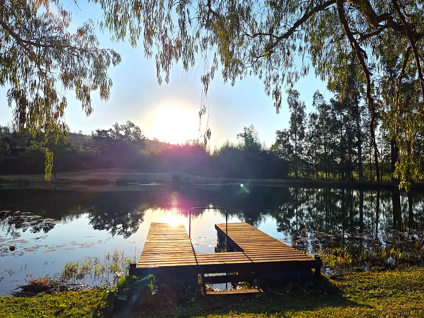 Sunset over the jetty on the dam
