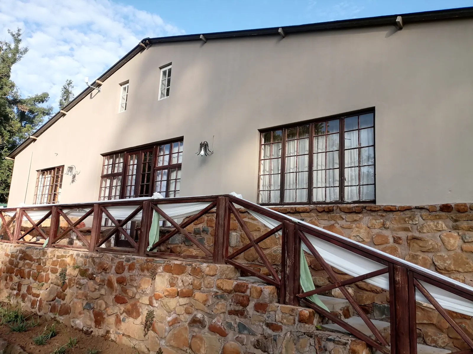 The venue building among the trees